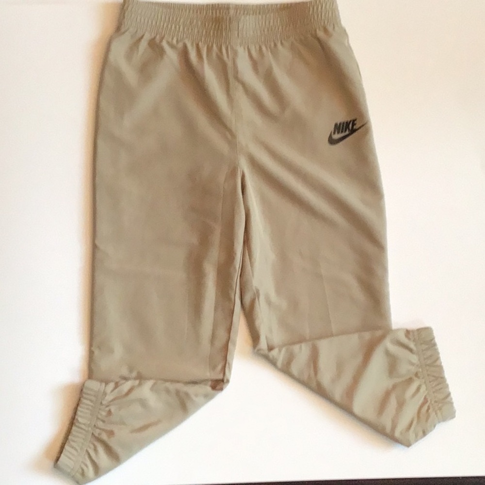 Nike Tan Wind Pants with Elastic Waistband and Tapered Fit